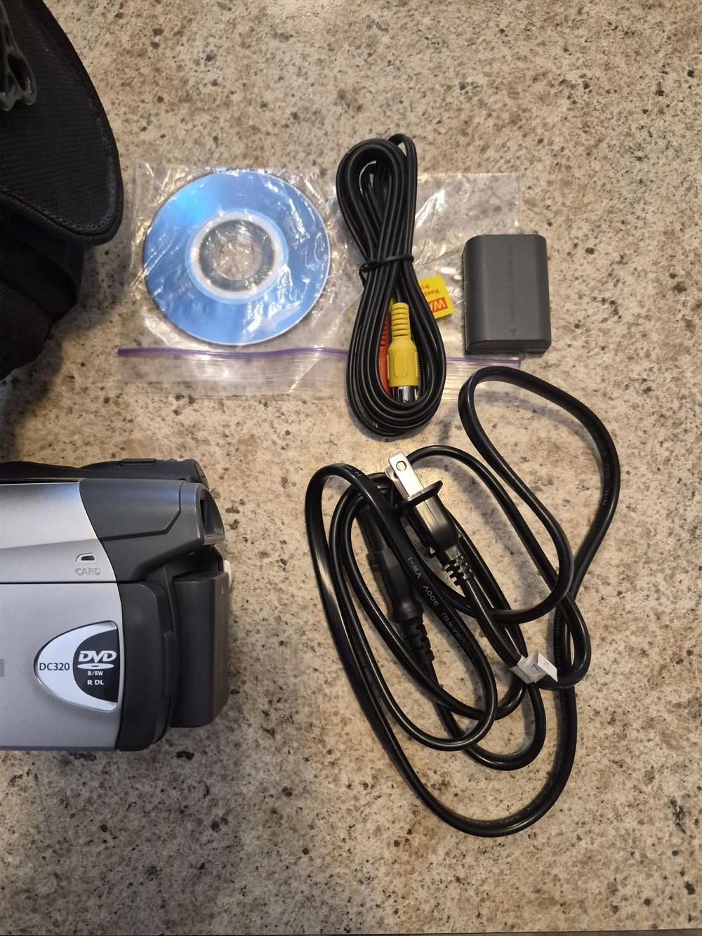 Canon Model # DC-320 Silver DVD Camcorder with Accessories